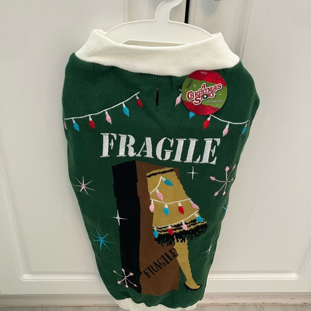 A Christmas story leg lamp dog sweater.  New!  Fun pet Christmas ugly sweater!